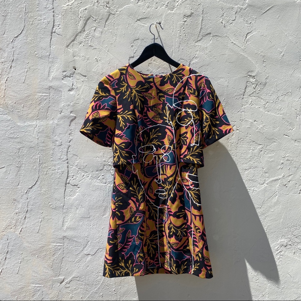 Striking color palette and patterned dress